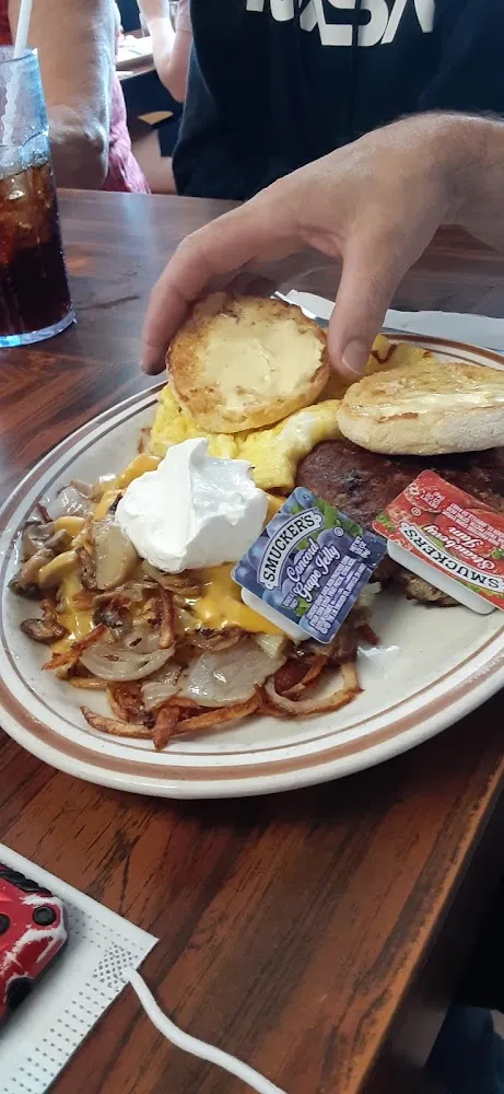 Two Eggs Smothered Hash Browns & Toast